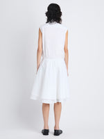 Back full length image of model wearing Cindy Dress In Washed Cotton Poplin in WHITE