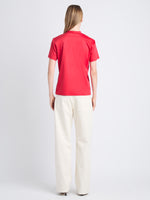 Back full length image of model wearing Talia V-Neck Top In Eco Cotton Jersey in RED