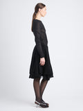 Side image of model wearing Dara Top In Technical Nylon Jersey in black