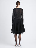 Back image of model wearing Dara Top In Technical Nylon Jersey in black