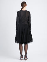 Back image of model wearing Dara Top In Technical Nylon Jersey in black