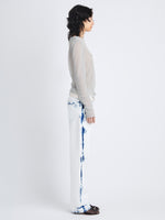 Side image of model wearing Dara Top In Technical Nylon Jersey in smoke
