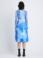 Back image of model wearing Amber Top In Printed Nylon Jersey in cerulean