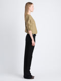 Side full length image of model wearing Addison Top In Washed Cotton Poplin in DRAB