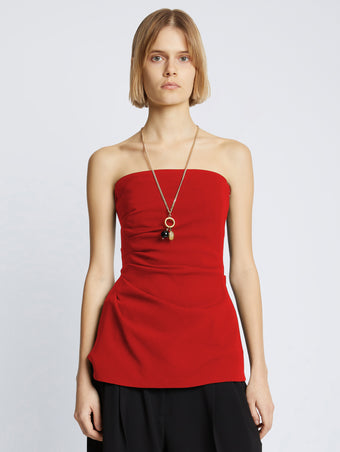 Cropped front image of Matte Viscose Crepe Strapless Top in RED