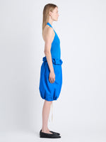 Side full length image of model wearing Hayley Skirt In Ligthweight Crinkle Poplin in BLUE