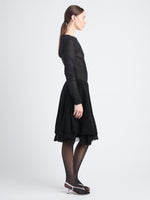 Side image of model wearing Julia Skirt In Micro Pleat Jersey in black