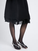 Detail image of model wearing Julia Skirt In Micro Pleat Jersey in black