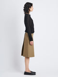 Side full length image of model wearing Adele Skirt In Eco Cotton Twill in DRAB