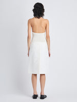 Back full length image of model wearing Adele Skirt In Eco Cotton Twill in EGGSHELL