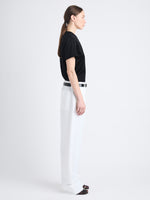 Side full length image of model wearing Joey Pant In Cotton Viscose in WHITE