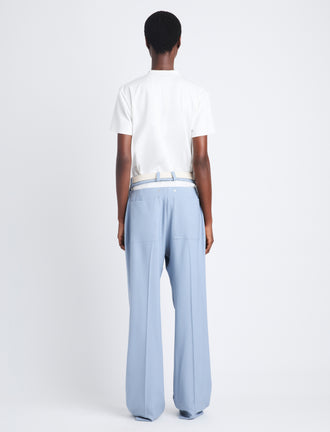 Back full length image of model wearing Otis Pant In Viscose Wool in STEEL