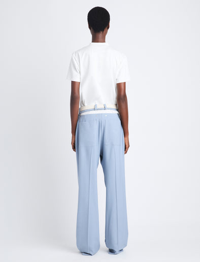 Back full length image of model wearing Otis Pant In Viscose Wool in STEEL