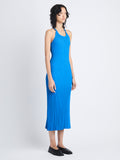 Side full length image of model wearing Vida Dress In Viscose Rib in BLUE