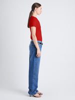 Side image of model wearing Sky Top In Matte Viscose Rib in red