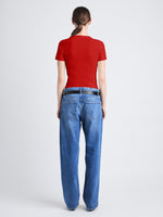 Back image of model wearing Sky Top In Matte Viscose Rib in red