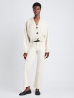 Front full length image of model wearing Sofia Cardigan In Eco Cashmere in IVORY