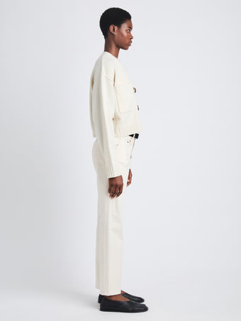 Side full length image of model wearing Sofia Cardigan In Eco Cashmere in IVORY