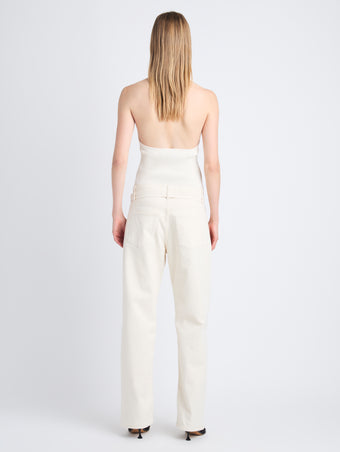 Back image of model wearing Ellsworth Jean in ecru