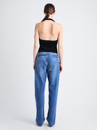 Back image of model in Ellsworth Jean in medium blue
