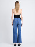 Back full length image of model wearing Jasper Jean in MEDIUIM BLUE