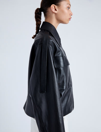 Detail image of model wearing Dylan Jacket in Glossy Leather in black