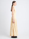 Side full length image of model wearing Simone Dress In Printed Viscose Crepe in YELLOW MULTI