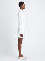 Side full length image of model wearing Viola Dress In Compact Poplin in WHITE