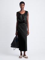 Front image of model wearing Lynn Dress in Eco Cotton Jersey in black