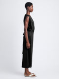 Side image of model wearing Lynn Dress in Eco Cotton Jersey in black