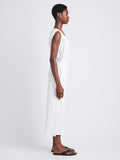 Side full length image of model wearing Lynn Dress In Eco Cotton Jersey in WHITE