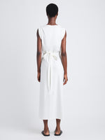 Back full length image of model wearing Lynn Dress In Eco Cotton Jersey in WHITE