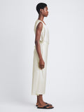 Side image of model wearing Lynn Dress in Eco Cotton Jersey in bone