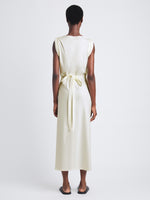 Back image of model wearing Lynn Dress in Eco Cotton Jersey in bone