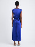 Back full length image of model wearing Lynn Dress In Eco Cotton Jersey in COBALT