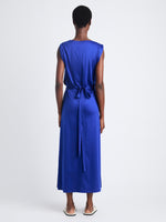 Back full length image of model wearing Lynn Dress In Eco Cotton Jersey in COBALT