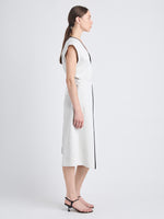 Side full length image of model wearing Monir Dress In Cotton Linen in ECRU