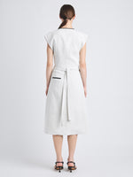 Back full length image of model wearing Monir Dress In Cotton Linen in ECRU