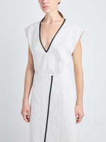 Detail image of model wearing Monir Dress In Cotton Linen in ECRU