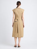 Back full length image of model wearing Monir Dress In Cotton Linen in HAZELNUT