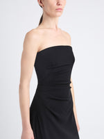 Detail image of model wearing Shira Strapless Dress In Matte Viscose Crepe in black