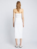 Back image of model wearing Shira Strapless Dress in Matte Viscose Crepe in white