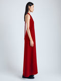 Side image of model wearing Ember Dress in Light Matte Viscose Crepe in red