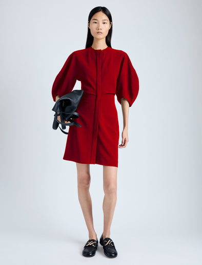 Front image of model wearing Goldie Dress in Matte Viscose Crepe in red