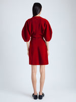 Back image of model wearing Goldie Dress in Matte Viscose Crepe in red