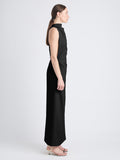 Side image of model wearing Selena Twist Back Dress in Matte Viscose Crepe in black