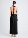 Back image of model wearing Selena Twist Back Dress in Matte Viscose Crepe in black