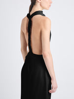 Detail image of model wearing Selena Twist Back Dress in Matte Viscose Crepe in black