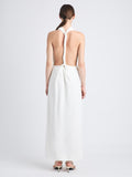 Back image of model wearing Selena Twist Back Dress in Matte Viscose Crepe in white