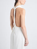 Detail image of model wearing Selena Twist Back Dress in Matte Viscose Crepe in white